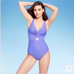 Kona Sol women’s size L 12/14 one piece cutout swimsuit.  Purple color. NWT